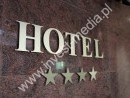 hotel logo on the entrance and reception